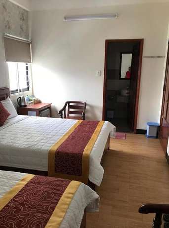 Imagen de la habitación del Hotel New Day Quy Nhon. Foto 15