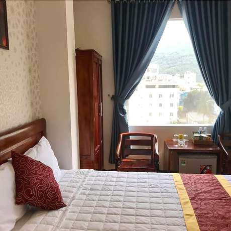 Imagen de la habitación del Hotel New Day Quy Nhon. Foto 17