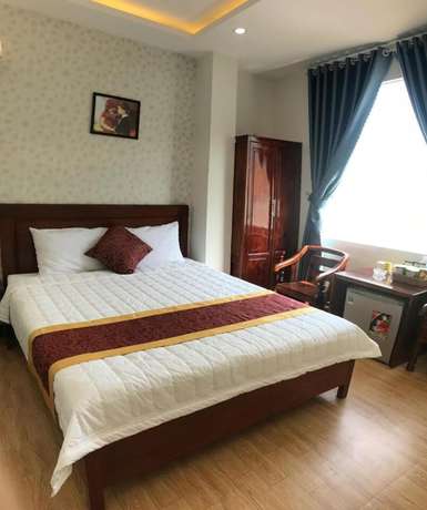 Imagen de la habitación del Hotel New Day Quy Nhon. Foto 18