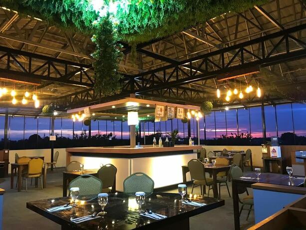 Imagen del bar/restaurante del Hotel New D'dhave. Foto 14