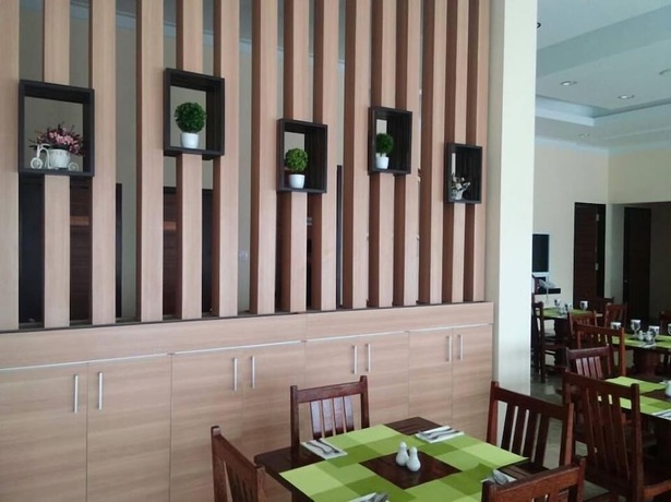 Imagen del bar/restaurante del Hotel New D'dhave. Foto 15