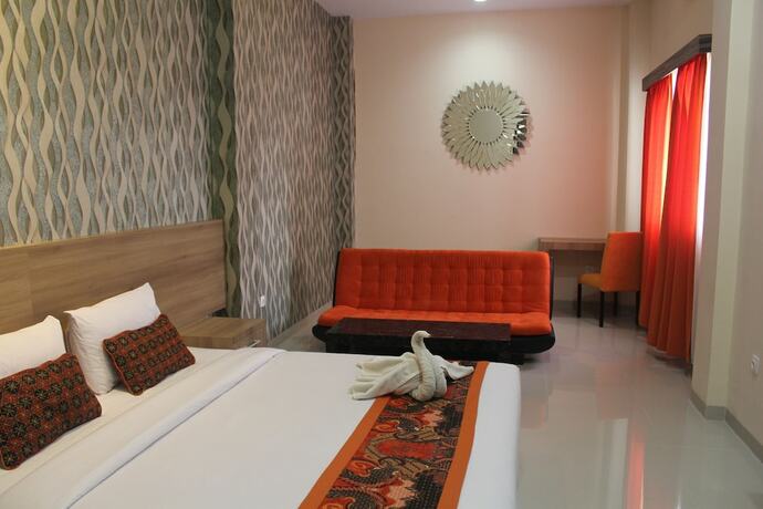 Imagen de la habitación del Hotel New D'dhave. Foto 17