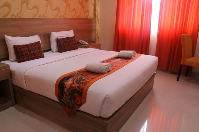 Imagen de la habitación del Hotel New D'dhave. Foto 18