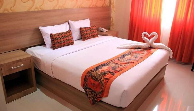 Imagen de la habitación del Hotel New D'dhave. Foto 20