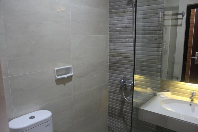 Imagen de la habitación del Hotel New D'dhave. Foto 22