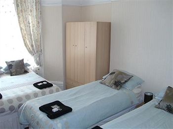 Imagen de la habitación del Hotel New Derina. Foto 3
