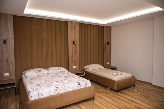 Imagen de la habitación del Hotel New Donantelo. Foto 16