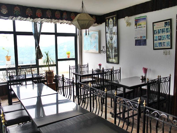 Imagen de los exteriores del Hotel New Dragon. Foto 9