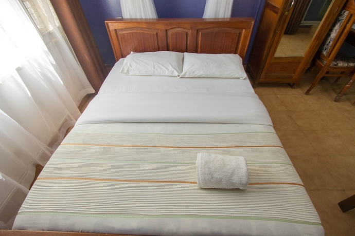 Imagen de la habitación del Hotel New East View. Foto 18