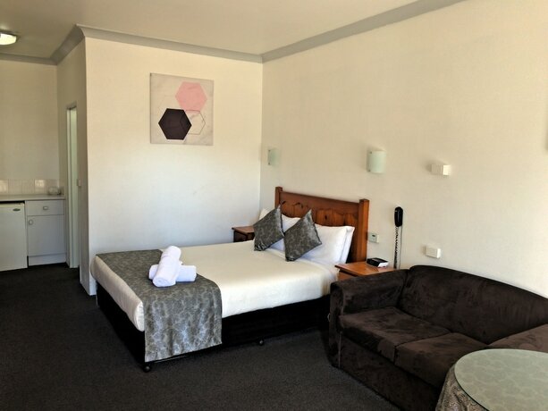 Imagen de la habitación del Hotel New England Motor Inn. Foto 11