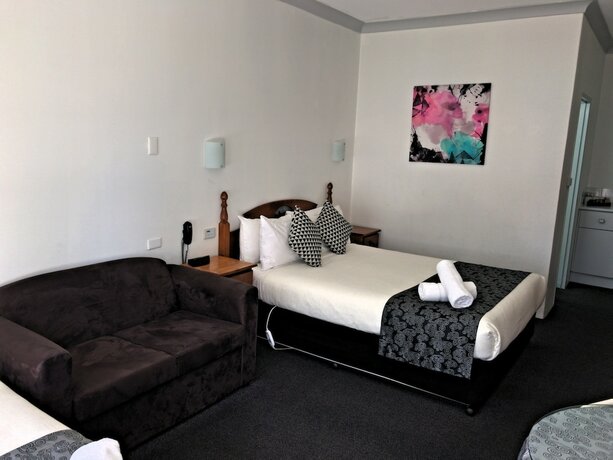 Imagen de la habitación del Hotel New England Motor Inn. Foto 19