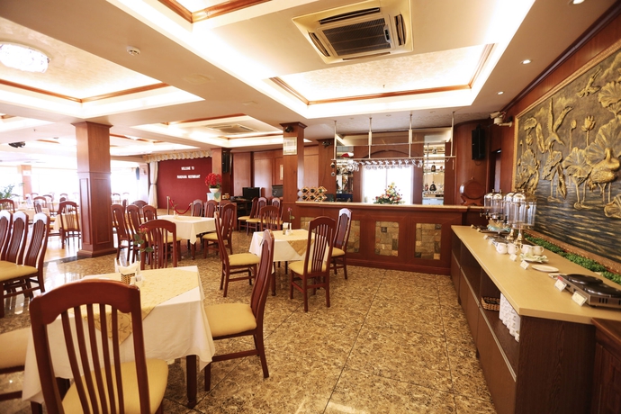 Imagen del bar/restaurante del Hotel New Epoch. Foto 8