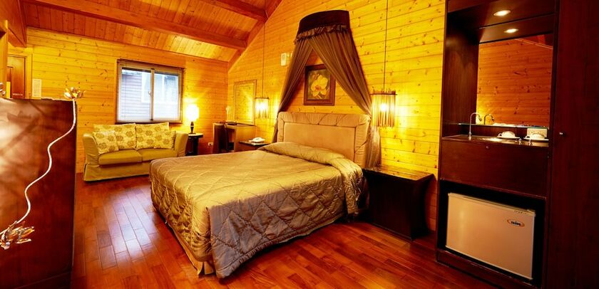 Imagen de la habitación del Hotel New Era Art Resort And Spa. Foto 11