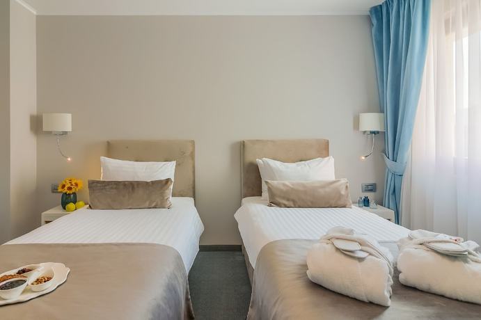 Imagen de la habitación del Hotel New Era Bucharest City. Foto 2