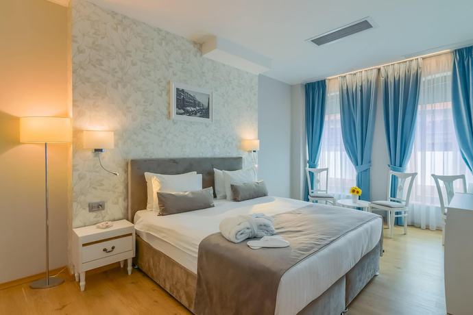 Imagen de la habitación del Hotel New Era Bucharest City. Foto 12