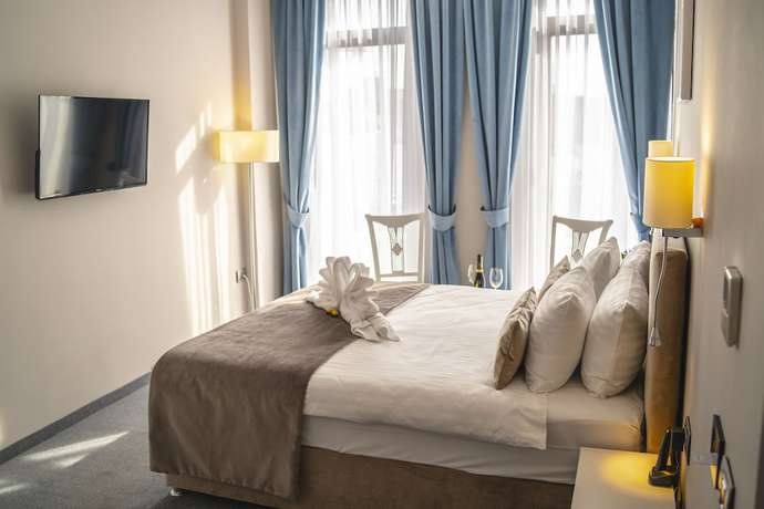 Imagen de la habitación del Hotel New Era Bucharest City. Foto 17