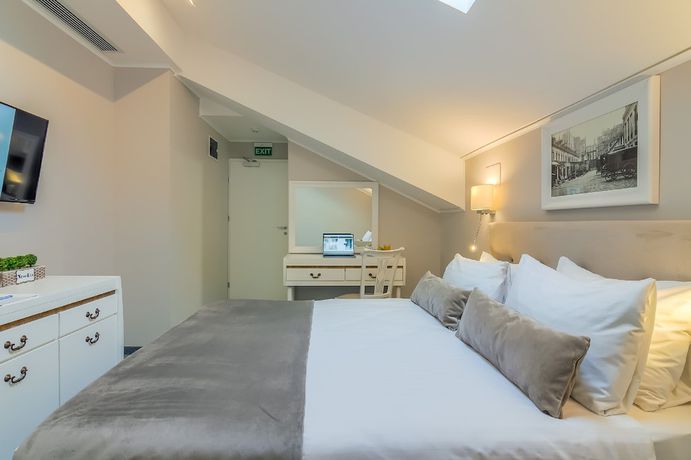 Imagen de la habitación del Hotel New Era Bucharest City. Foto 18