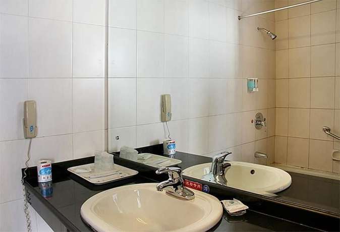 Imagen de la habitación del Hotel New Era Hotel. Foto 3