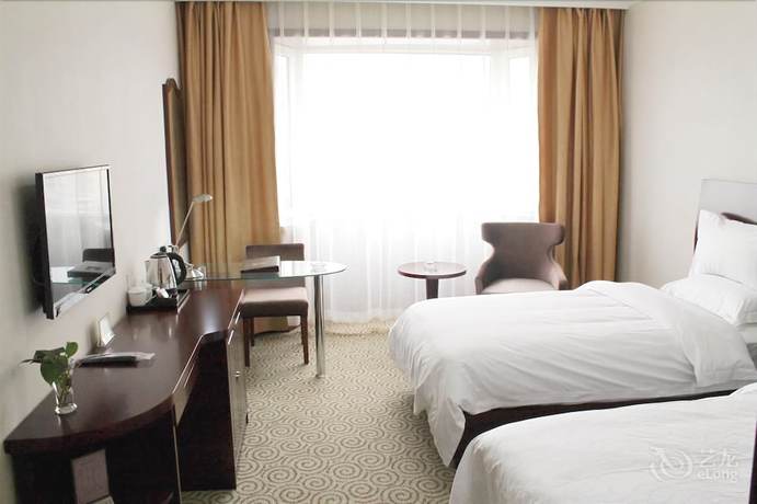 Imagen de la habitación del Hotel New Era Hotel. Foto 5
