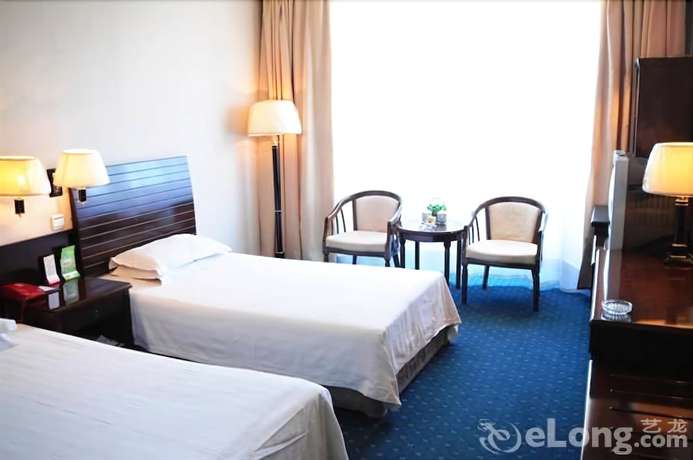 Imagen de la habitación del Hotel New Era Hotel. Foto 7