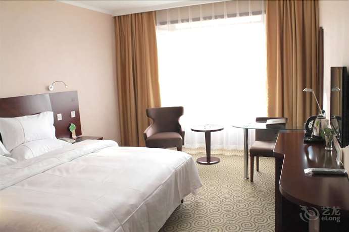 Imagen de la habitación del Hotel New Era Hotel. Foto 9
