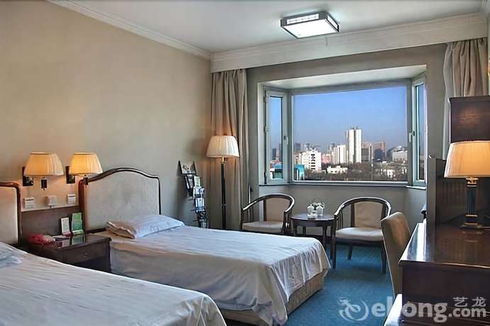 Imagen de la habitación del Hotel New Era Hotel. Foto 12