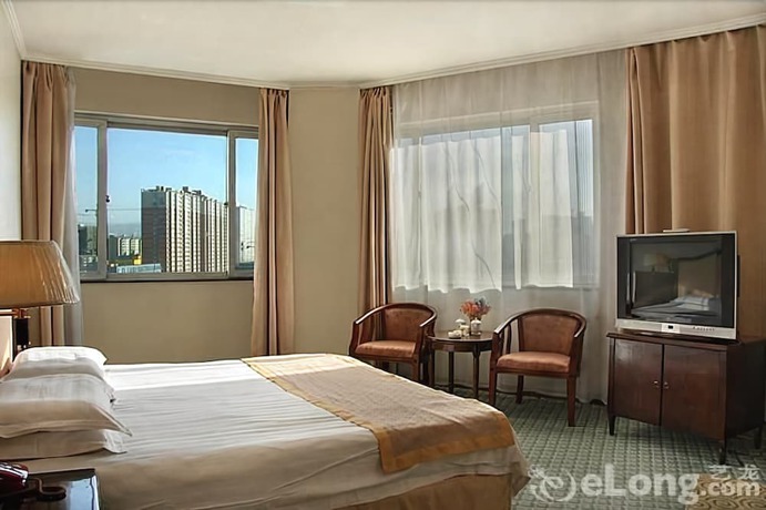 Imagen de la habitación del Hotel New Era Hotel. Foto 13