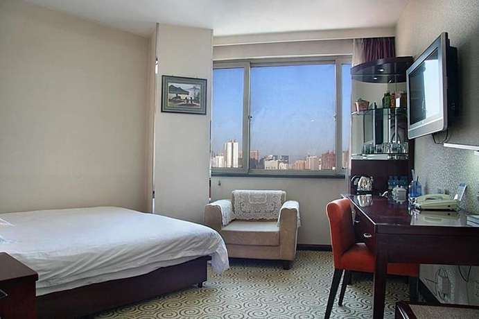 Imagen de la habitación del Hotel New Era Hotel. Foto 16