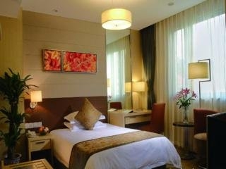 Imagen de la habitación del Hotel New Era Nanjing. Foto 6