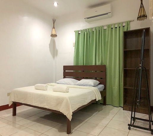 Imagen de la habitación del Hotel New Eve's Kiosk Dive Resort. Foto 4