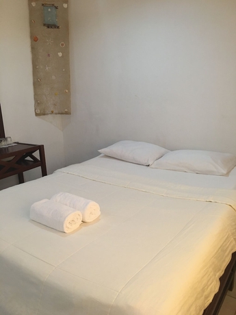 Imagen de la habitación del Hotel New Eve's Kiosk Dive Resort. Foto 5