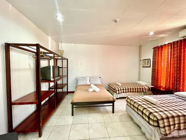 Imagen de la habitación del Hotel New Eve's Kiosk Dive Resort. Foto 6