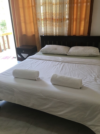 Imagen de la habitación del Hotel New Eve's Kiosk Dive Resort. Foto 10