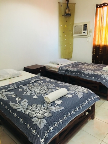 Imagen de la habitación del Hotel New Eve's Kiosk Dive Resort. Foto 12