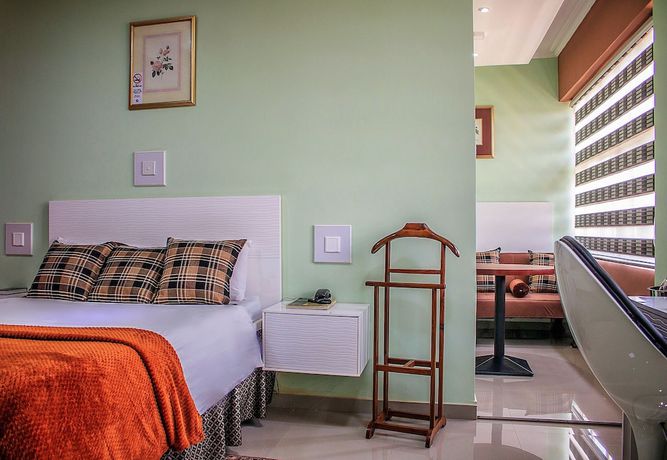 Imagen de la habitación del Hotel New Fairmount and Casino. Foto 4