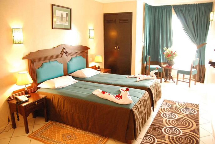 Imagen de la habitación del Hotel New Farah. Foto 6