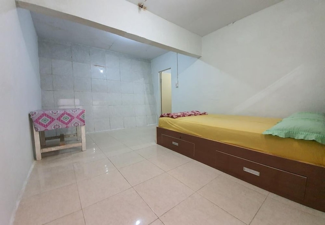 Imagen de la habitación del Hotel New Fatimah Guest House Syariah. Foto 11
