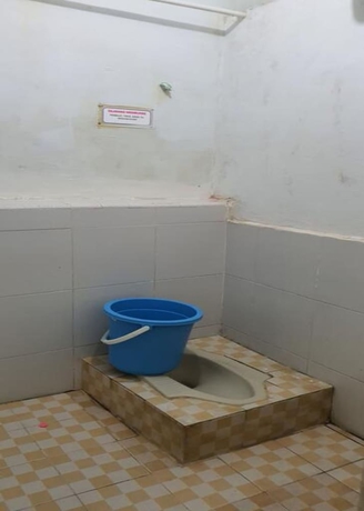 Imagen de la habitación del Hotel New Fatimah Guest House Syariah. Foto 12