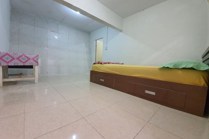 Imagen de la habitación del Hotel New Fatimah Guest House Syariah. Foto 14