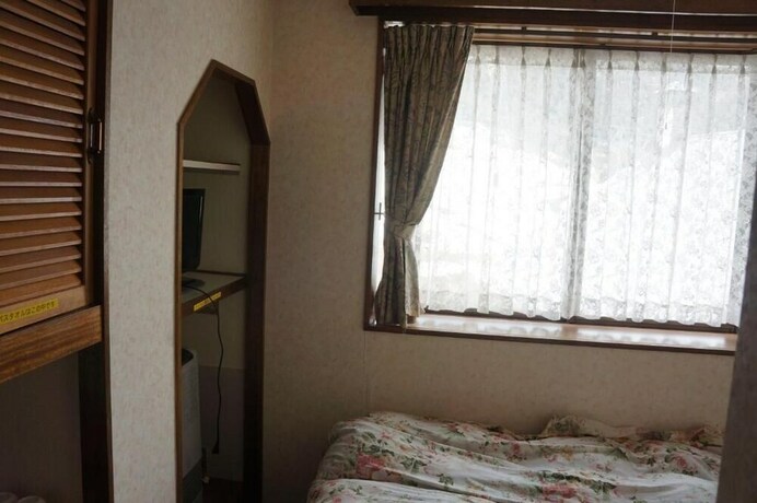 Imagen de la habitación del Hotel New Fukudaya. Foto 19