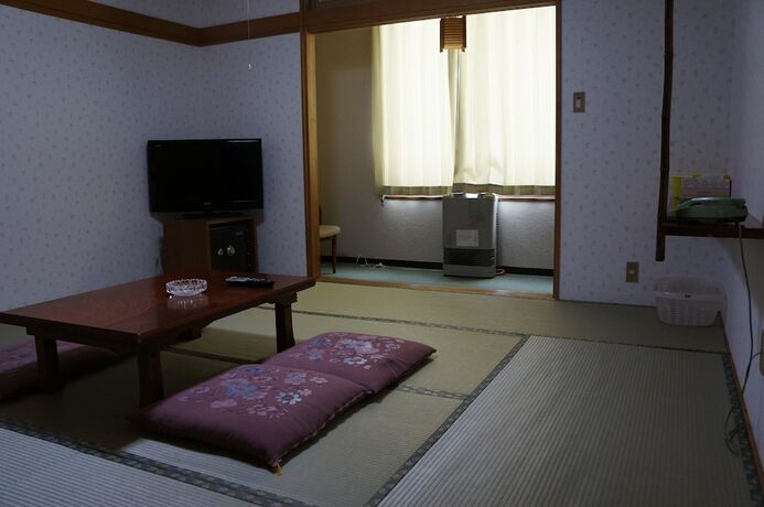 Imagen de la habitación del Hotel New Fukudaya. Foto 21