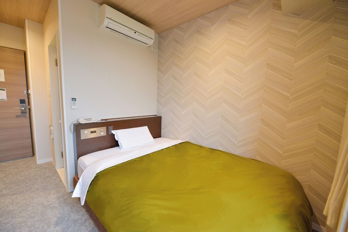 Imagen de la habitación del Hotel New Gaea Hakata Messeminami. Foto 4