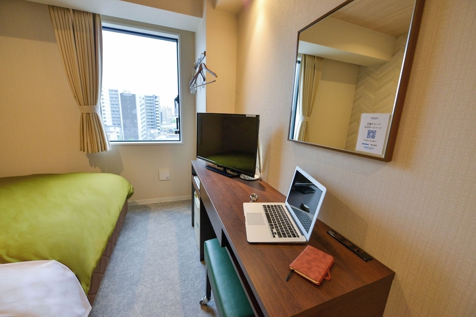 Imagen de la habitación del Hotel New Gaea Hakata Messeminami. Foto 5