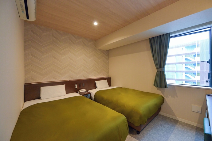 Imagen de la habitación del Hotel New Gaea Hakata Messeminami. Foto 6