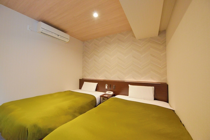 Imagen de la habitación del Hotel New Gaea Hakata Messeminami. Foto 7