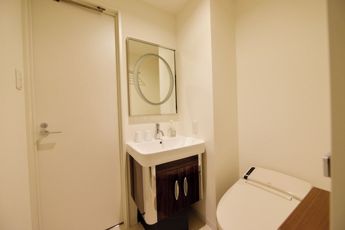 Imagen de la habitación del Hotel New Gaea Hakata Messeminami. Foto 10