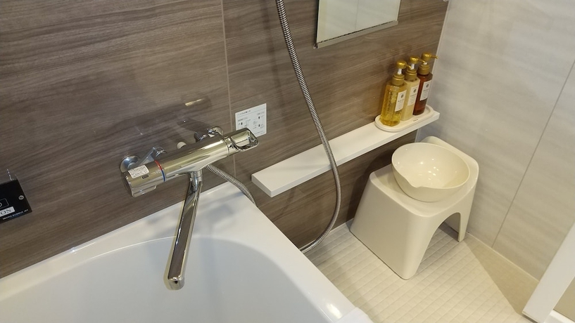 Imagen de la habitación del Hotel New Gaea Hakata Messeminami. Foto 11