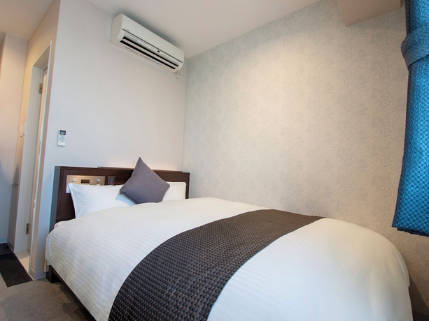 Imagen de la habitación del Hotel New Gaea Hakata Messeminami. Foto 12