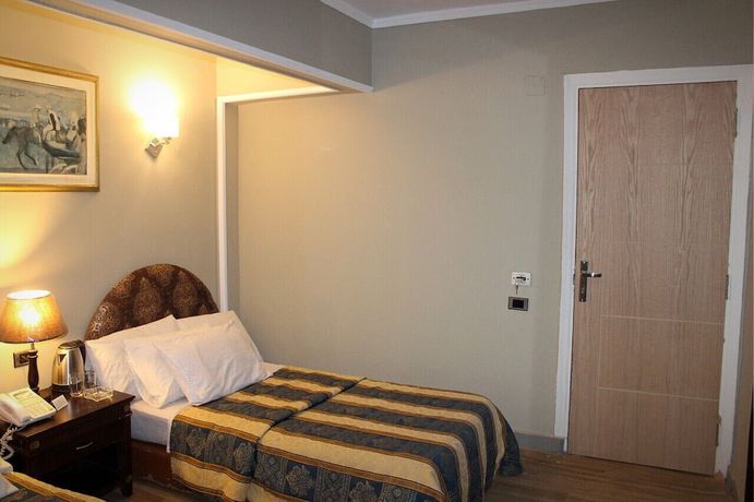 Imagen de la habitación del Hotel New Garden Palace. Foto 7