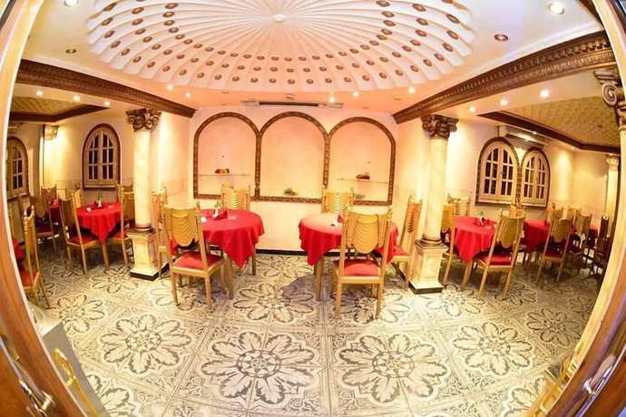 Imagen del bar/restaurante del Hotel New Garden Palace. Foto 6